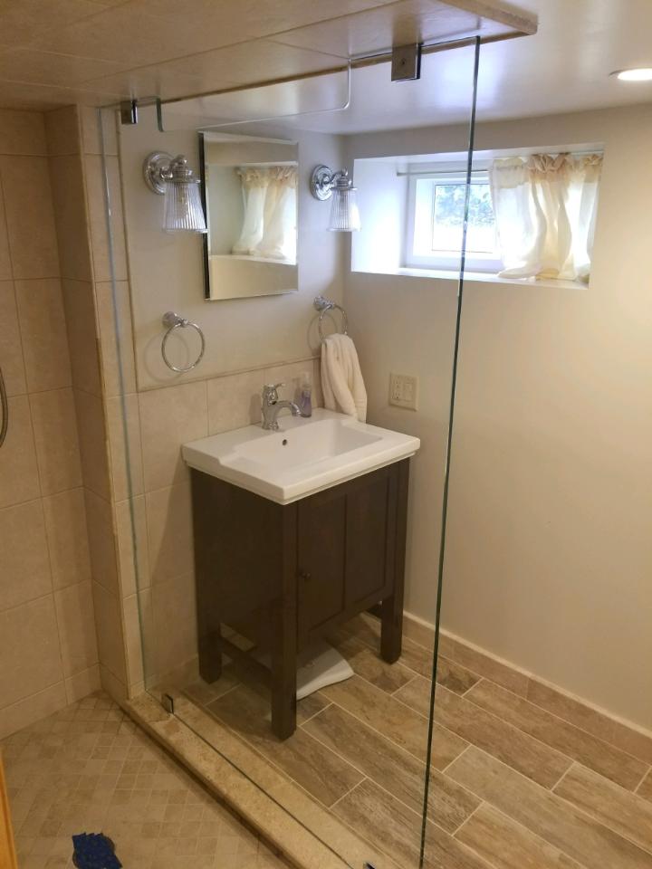 Frameless Glass Shower Enclosure with Single Door and Fixed Panel by Simply Elegant