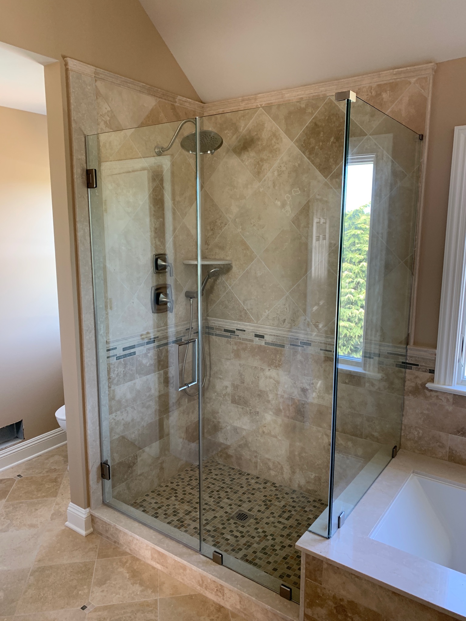 Custom Frameless Shower Door by Simply Elegant