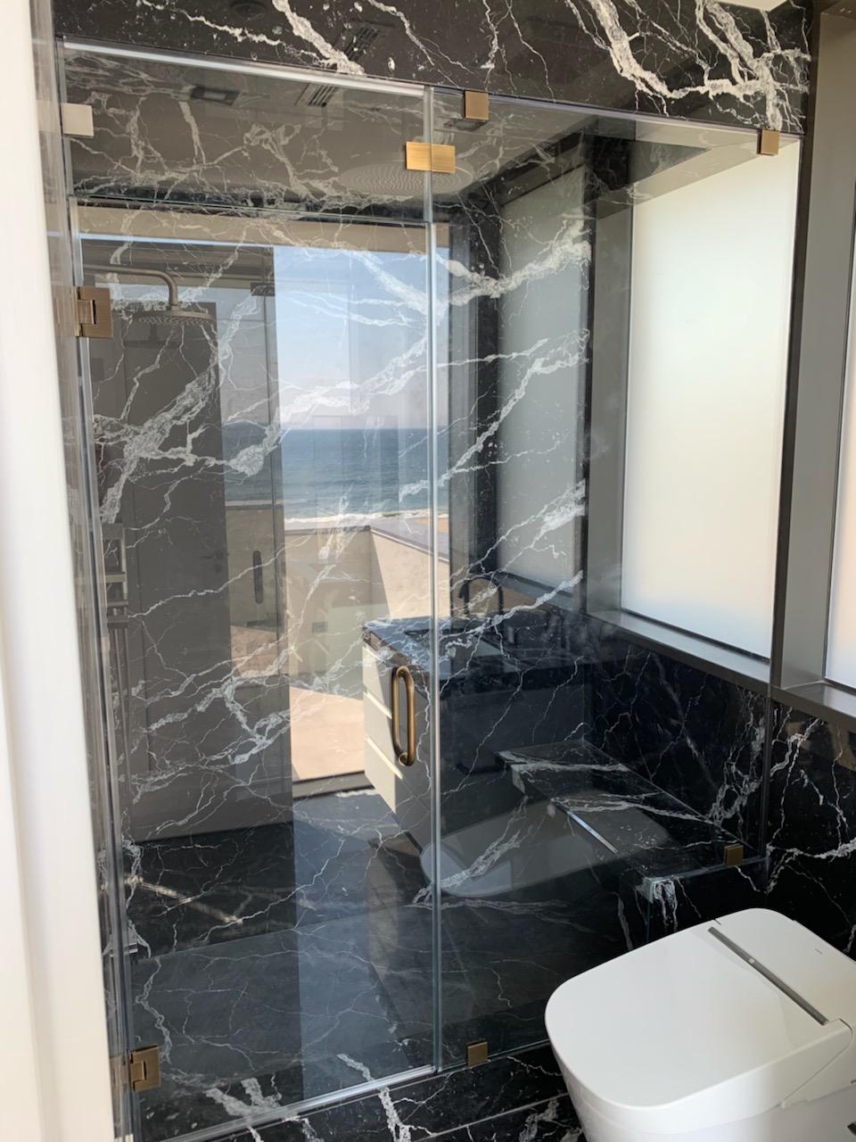 Custom Frameless Glass Shower Door by Simply Elegant