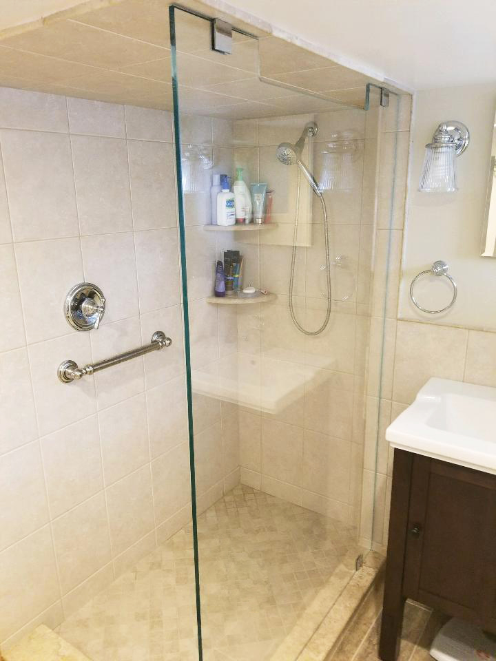 Custom Frameless Glass Shower Panel by Simply Elegant